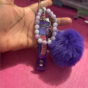 Purple Pom Pom card grabber with Beaded Bracelet